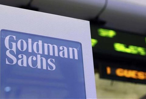 A Goldman Sachs sign is seen on at the company's post on the floor of the New York Stock Exchange