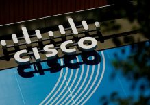 FILE PHOTO: The logo of U.S. networks giant Cisco Systems is seen in front of their headquarters near Paris