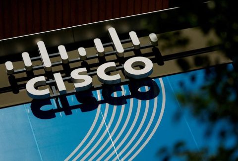 FILE PHOTO: The logo of U.S. networks giant Cisco Systems is seen in front of their headquarters near Paris